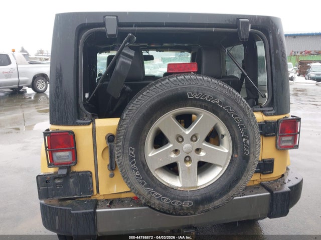 1C4AJWAG5EL209935 Jeep Wrangler Freedom Edition