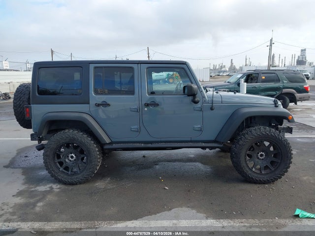 1C4BJWDGXFL693120 Jeep Wrangler Unlimited Sport
