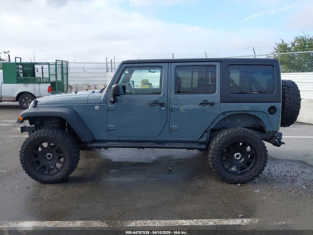 1C4BJWDGXFL693120 Jeep Wrangler Unlimited Sport