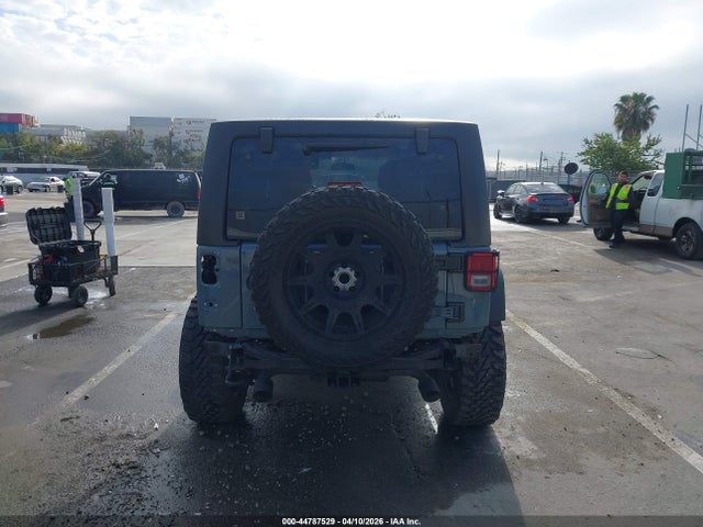 1C4BJWDGXFL693120 Jeep Wrangler Unlimited Sport
