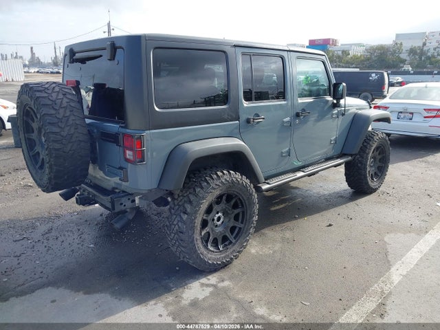 1C4BJWDGXFL693120 Jeep Wrangler Unlimited Sport