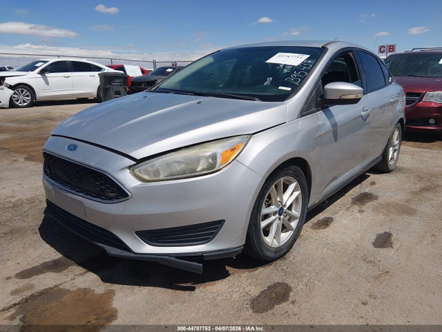 2016 FORD FOCUS 1FADP3F28GL395437 Photo 1