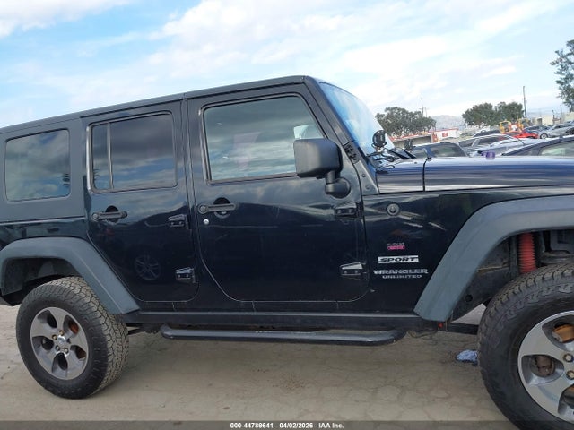 1C4BJWDG6EL117233 Jeep Wrangler Unlimited Sport