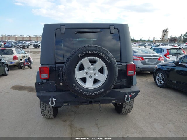 1C4BJWDG6EL117233 Jeep Wrangler Unlimited Sport