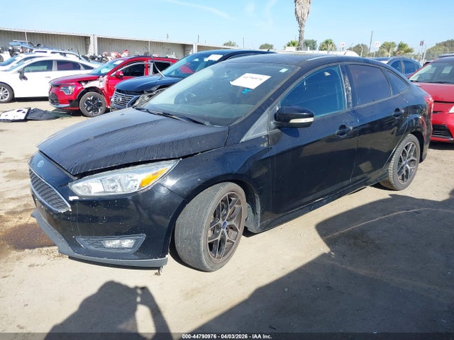 2016 FORD FOCUS 1FADP3F29GL216130 Photo 1