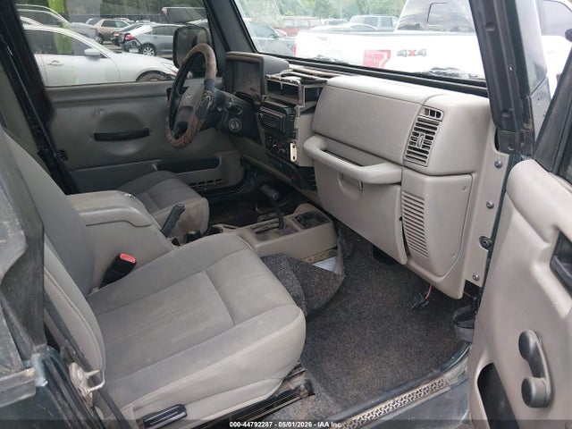 44792287 :رقم المزاد ، 1J4FA59S73P302710 vin ، 2003 Jeep Wrangler Sahara مزاد بيع