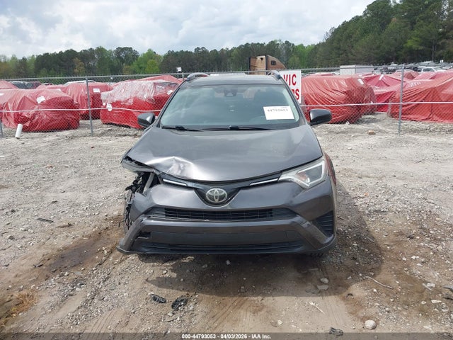 JTMZFREV9JJ751401 Toyota RAV4 LE