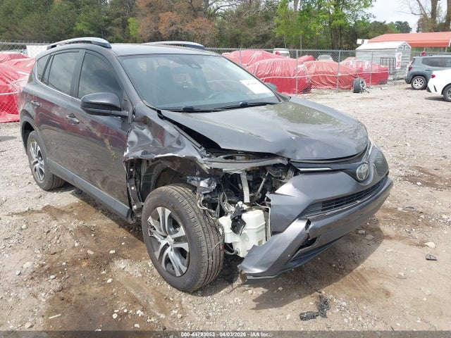 JTMZFREV9JJ751401 Toyota RAV4 LE