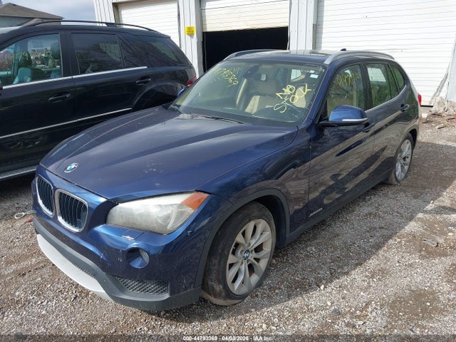2013 BMW X1 WBAVL1C56DVR90104 Photo 1