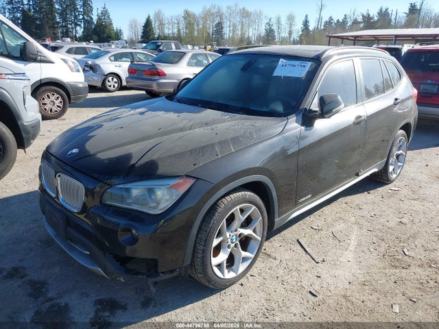 2013 BMW X1 WBAVM5C50DVL63757 Photo 1