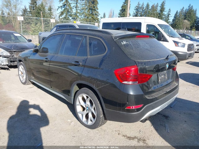 2013 BMW X1 WBAVM5C50DVL63757 Photo 2