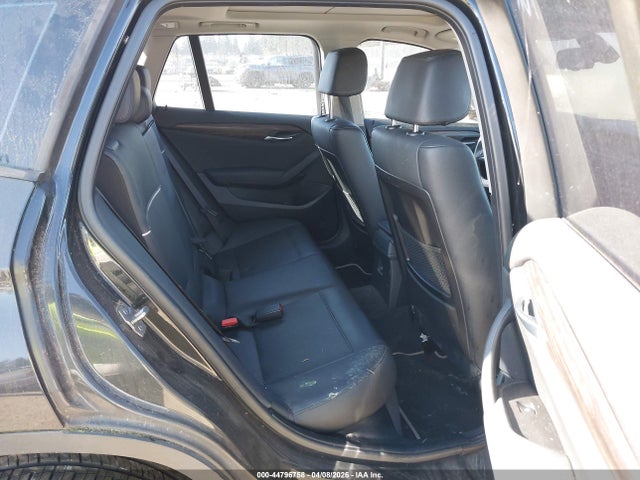 2013 BMW X1 WBAVM5C50DVL63757 Photo 7