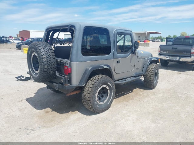 Auction sale of the 2001 Jeep Wrangler Sport, vin: 1J4FA49S81P328093, lot number: 44797796