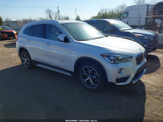 2016 BMW X1 WBXHT3C34G5E47502
