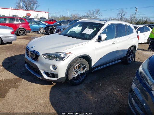 2016 BMW X1 WBXHT3C34G5E47502 Photo 1