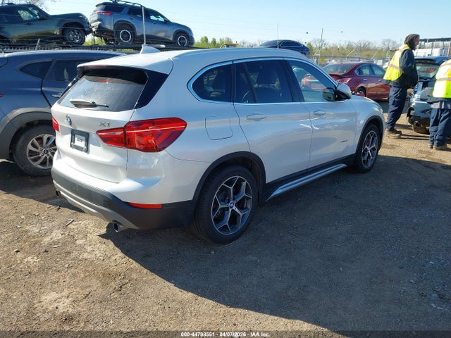 2016 BMW X1 WBXHT3C34G5E47502 Photo 3