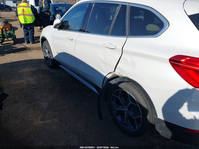 2016 BMW X1 WBXHT3C34G5E47502 Photo 5