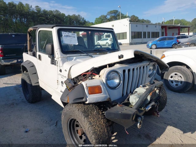 44806332 :رقم المزاد ، 1J4FY49SXXP414106 vin ، 1999 Jeep Wrangler Sahara مزاد بيع