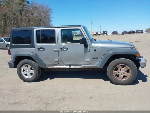 44809479 :رقم المزاد ، 1C4HJWDG1EL101077 vin ، 2014 Jeep Wrangler Unlimited Sport مزاد بيع