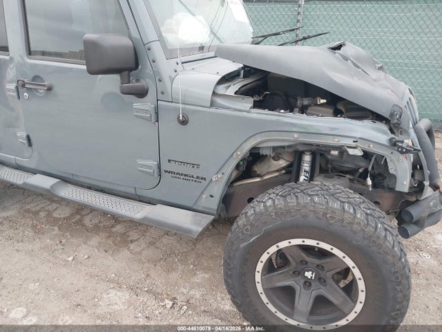 1C4BJWDG5EL127669 Jeep Wrangler Unlimited Sport