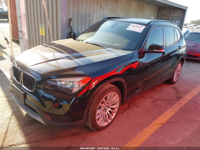 2013 BMW X1 WBAVM1C52DVW42412 Photo 1