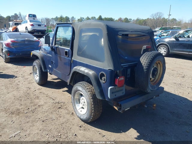 2000 JEEP WRANGLER 1J4FA29P7YP769806 Photo 2