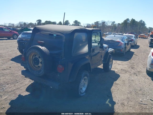 2000 JEEP WRANGLER 1J4FA29P7YP769806 Photo 3