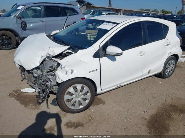 2012 TOYOTA PRIUS C JTDKDTB33C1514283 Photo 1