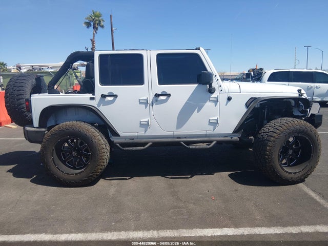 1C4HJWDG2GL162344 Jeep Wrangler Unlimited Sport