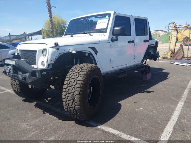 1C4HJWDG2GL162344 Jeep Wrangler Unlimited Sport