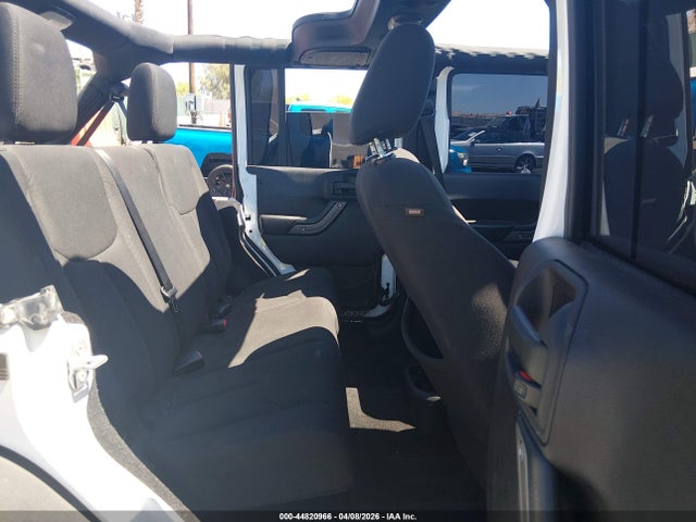 1C4HJWDG2GL162344 Jeep Wrangler Unlimited Sport