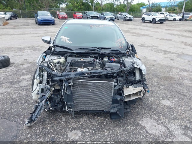Продажа на аукционе авто 2018 Honda Civic Lx, vin: 19XFC2E53JE035738, номер лота: 44822449