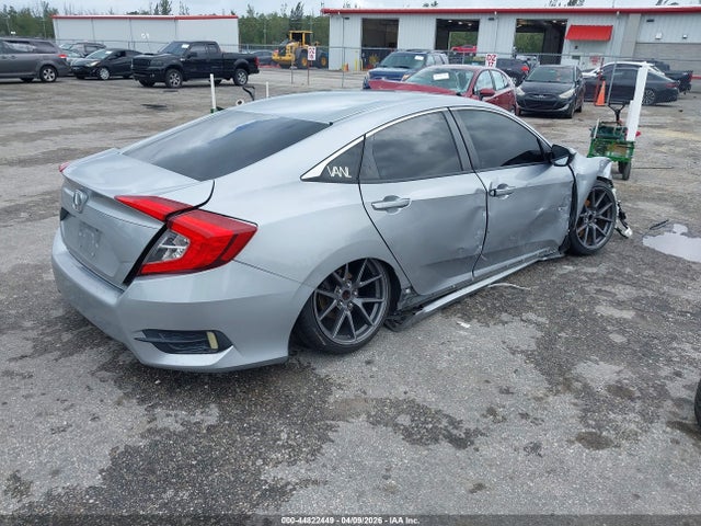 Продажа на аукционе авто 2018 Honda Civic Lx, vin: 19XFC2E53JE035738, номер лота: 44822449