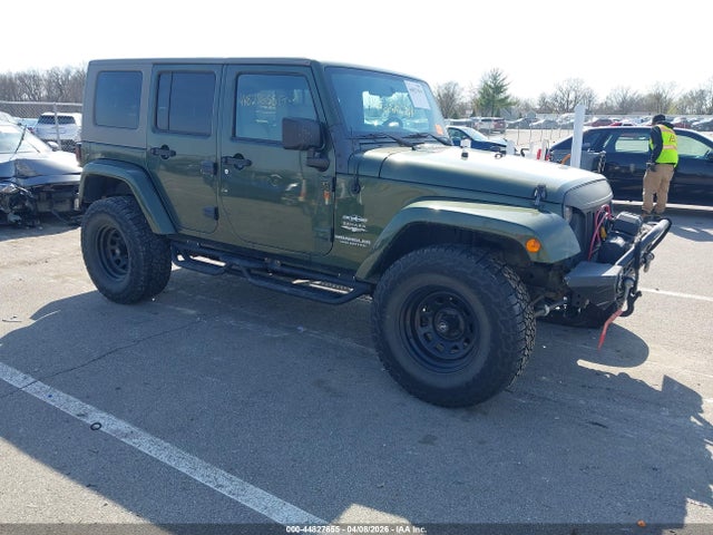 2008 Jeep Wrangler Unlimited Sahara მანქანა იყიდება აუქციონზე, vin: 1J4GA59148L634579, აუქციონის ნომერი: 44827655