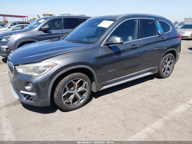 2016 BMW X1 WBXHT3C37GP880698 Photo 1