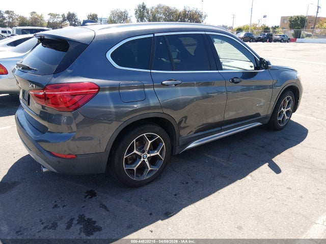 2016 BMW X1 WBXHT3C37GP880698 Photo 3