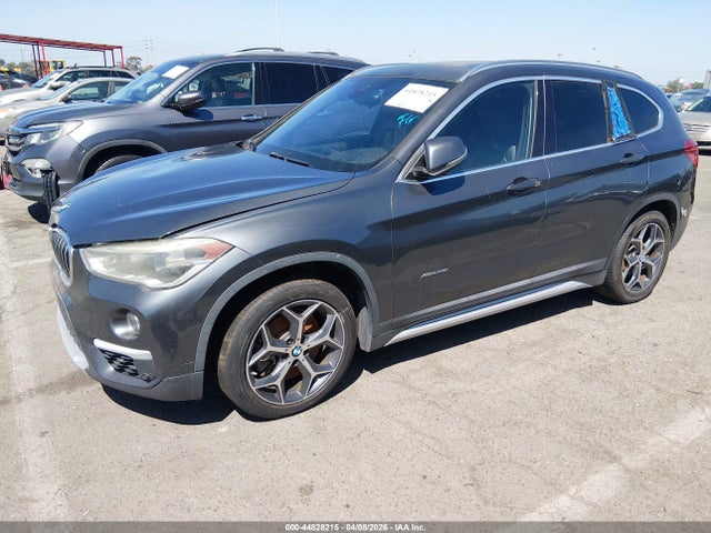 2016 BMW X1 WBXHT3C37GP880698 Photo 5