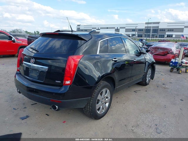 Auction sale of the 2014 Cadillac Srx Luxury Collection, vin: 3GYFNBE35ES547060, lot number: 44833385