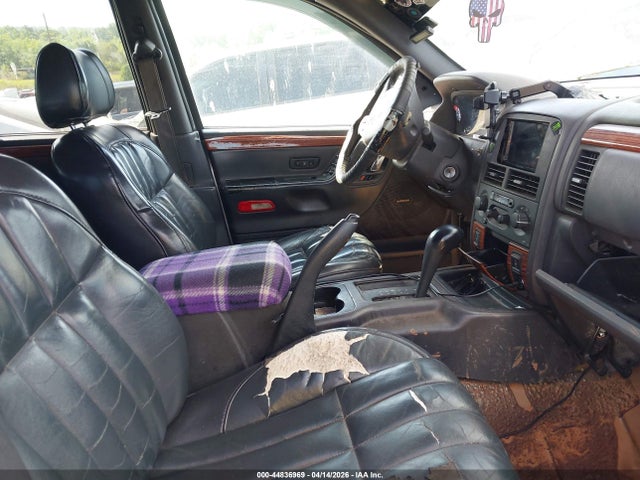 1999 Jeep Grand Cherokee Limited მანქანა იყიდება აუქციონზე, vin: 1J4G268S6XC788724, აუქციონის ნომერი: 44836969