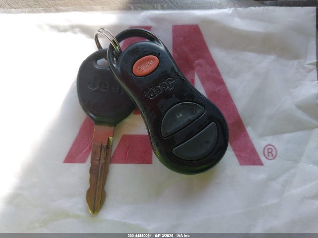 44850091 :رقم المزاد ، 1J4GW58S5XC516390 vin ، 1999 Jeep Grand Cherokee Laredo مزاد بيع