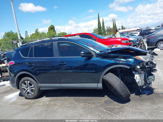 JTMZFREV0JJ734566 Toyota RAV4 LE
