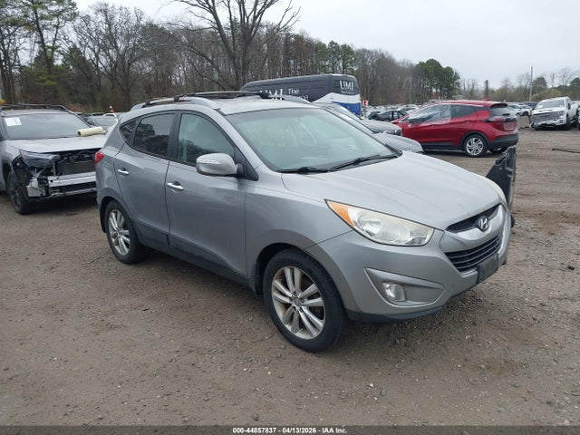 2012 HYUNDAI TUCSON KM8JUCACXCU424524
