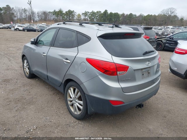 2012 HYUNDAI TUCSON KM8JUCACXCU424524 Photo 2
