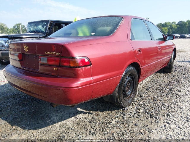 44860356 :رقم المزاد ، 4T1BF22KXVU024691 vin ، 1997 Toyota Camry Le V6 مزاد بيع
