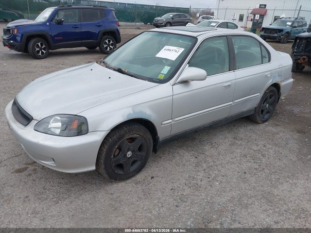 1999 HONDA CIVIC 1HGEJ8542XL018748 Photo 1