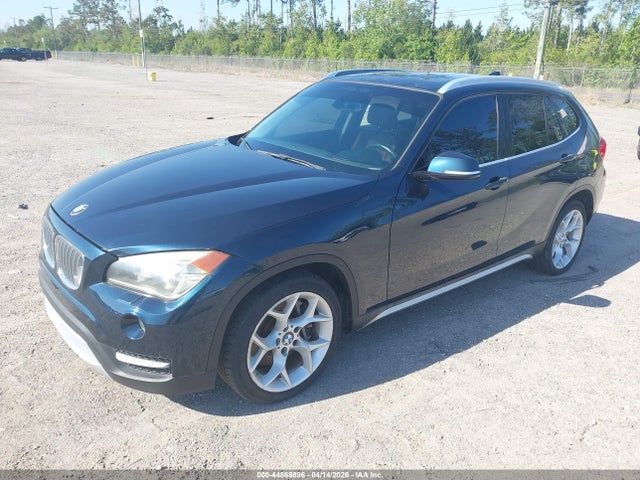 2013 BMW X1 WBAVM5C59DVV91028 Photo 1