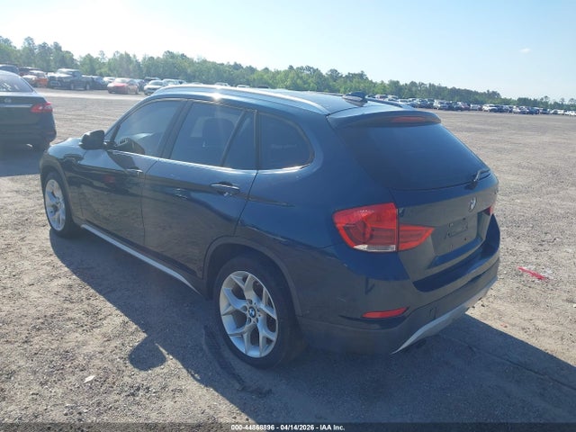 2013 BMW X1 WBAVM5C59DVV91028 Photo 2