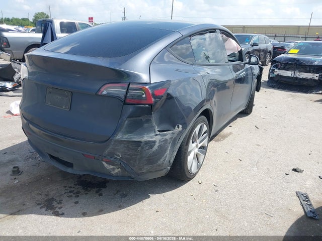2024 Tesla Model Y Long Range Dual Motor All-wheel Drive მანქანა იყიდება აუქციონზე, vin: 7SAYGAEEXRF075122, აუქციონის ნომერი: 44870606