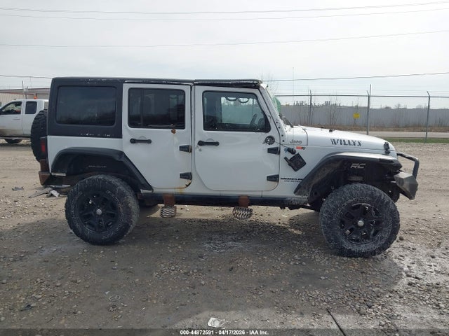 Продажа на аукционе авто 2015 Jeep Wrangler Unlimited Willys Wheeler, vin: 1C4BJWDG5FL591272, номер лота: 44872591
