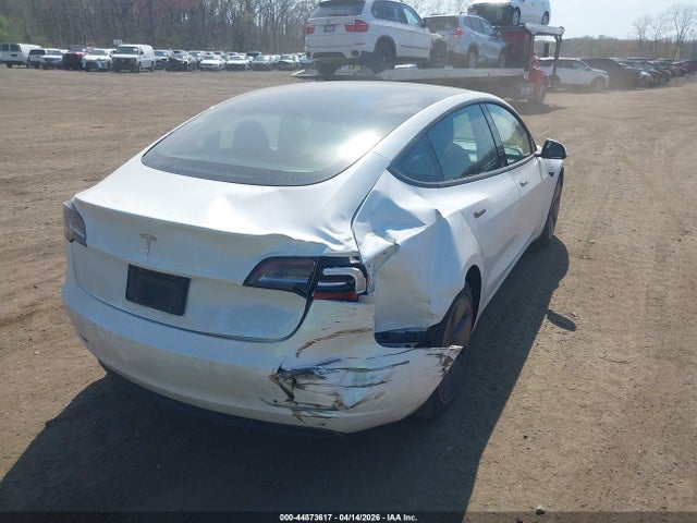 2021 Tesla Model 3 Standard Range Plus Rear-wheel Drive მანქანა იყიდება აუქციონზე, vin: 5YJ3E1EA3MF048024, აუქციონის ნომერი: 44873617